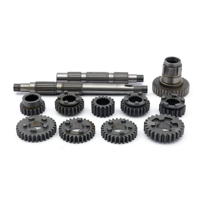 Replacement gears & shafts for rear chain drive models. Kit includes all 1st, 2nd, 3rd., 4th., 5th. counter & main gears and both main and countershaft. Stock replacement gears with stock gear ratios. High quality nickel alloy steel, heat treated & shot peened. Lead-in ramps are used, where applicable, to improve shifting and reduce wear on drive dogs and slots.