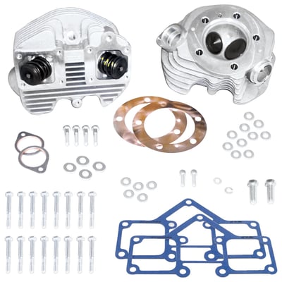 Natural aluminum finish. Band-type style. Stock style, 3-5/8 big bore cylinder heads from S&S for 66-84 Shovelhead models. S&S heads are designed as stock replacement. Still, where stock heads flow about 124 cfm @ 10", S&S heads do improve these figures somewhat and typically flow around 135 cfm @ 10". Heads come assembled with valves, springs, collars, valve guide seals, rocker cover and exhaust mount hardware etc. (excl. rocker arms and covers) and complete with cylinder head, rocker cover and exhaust gaskets. These heads are ready to run and will accept camshafts with a lift of up to .590".