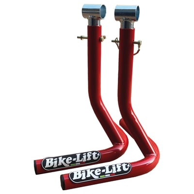 Red powder coated steel. Center stand. Includes adapters for non-folding racing style footpegs. Track use. Width: 40cm. Height: 43cm maximum. Height: 37cm minimum. Length: 20cm. Weight: 3.0kg
Note: Do not sit on motorcycles when using bike stands.
