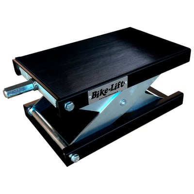 Black powder coated and zinc plated. Minimum height 8.5cm; Max. height 35cm; Max. lifting capacity 500kg; 25cm wide x 40cm long platform. 
Small but very capable and a quality mini-lift is an absolute necessity in any professional workshop. With the Bike-Lift name on it you can be assured of high end quality of this versatile center lift. 
Note: For bikes with a non-flat underside universal frame adapter set is available as 529212. Compatible with the 25cm wide center lift 529211 only. 
Note 1: Use with a 24mm manual operated wrench only. Air or electric wrenches will damage the lifting threads permanently. 
Note 2: Be safe. When using the center lift always secure the bike with tie-downs.
