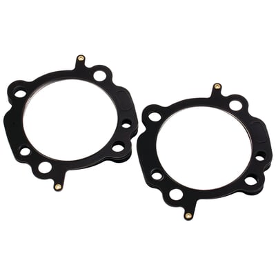MLS (Multi Layer Steel). Front & rear gasket for one engine. 3-7/8" (3.875") fits 103" OEM H-D Twin Cooled engines only. Will not fit 103" non-Twin Cooled models. 
Stock Twin Cam gasket is approx. .040" thick. 
OEM replacement reference 16500066. 
MLS (Multi Layer Steel) explained: MLS consists of a top and bottom layer of embossed stainless steel with both side coated with 250°C high temperature polymer rubber layer. The inner ring(s) are also stainless steel. The gasket layers are rivited together, outside the gasket surface, for ease of installation. The outer layers are embossed and both sides coated with a 250°C resitant polymer rubber layer. MLS head gaskets eliminate the use of dowel pin o-rings, when in use.
