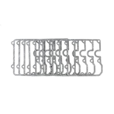 Fiber. OEM replacement reference 34904-79. 
Cometic's fiber gaskets are made from premium hi-temperature, hi-density creep resistant material that requires no re-torquing, no additional sealants, is fuel resistant and asbestos free. 
