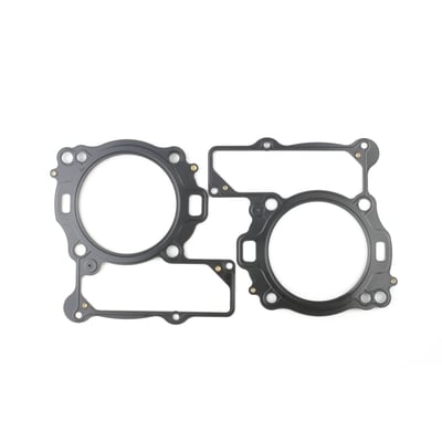 .030" MLS (Multi Layer Steel). 
MLS consists of a top and bottom layer of embossed stainless steel with both side coated with 250°C high temperature polymer rubber layer. The inner ring(s) are also stainless steel. The gasket layers are rivited together, outside the gasket surface, for ease of installation. The outer layers are embossed and both sides coated with a 250°C resitant polymer rubber layer. MLS head gaskets eliminate the use of dowel pin o-rings.