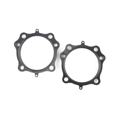 .036" thick MLS (Multi Layer Steel). Consists of a top and bottom layer of embossed stainless steel with both side coated with 250°C high temperature polymer rubber layer. The inner ring(s) are also stainless steel. The gasket layers are rivited together, outside the gasket surface, for ease of installation. The outer layers are embossed and both sides coated with a 250°C resitant polymer rubber layer. MLS head gaskets eliminate the use of dowel pin o-rings.