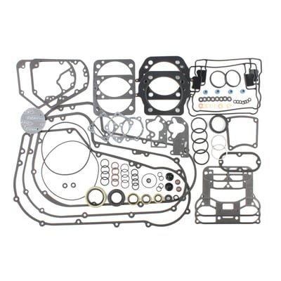 With .040" MLS (Multi Layer Steel) head gaskets. 
This EST (Extreme-Sealing-Technology) gasket sets are complete with all gaskets, seals and o-rings that are used on the specific H-D model that is mentioned, excluding primary gaskets. 
It's the easy way to do a complete overhaul and have all gaskets that are necessary in one package to reassemble the engine.
This EST gasket set contain MLS (Multi-Layer-Steel) head gaskets which eliminates the use of dowel pin o-rings. 
Base gaskets are SLS (Single Layer Steel) .020" thick. 
They have .005" of high temperature Viton rubber on both sides and are the strongest on the market. 
Rocker cover gaskets are also .020" thick SLS. They will not weep, extrude, tear or become brittle over time. 
Exhaust gaskets will not hinder exhaust gas flow and will not fray into the exhaust port. 
Valve seals utilize Viton rubber and outer springs for a perfect seal. 
- MLS = Multi-Layer-Steel explained: 
Consists of a top and bottom layer of stainless spring steel which is covered by high temperature rubber on both sides. The inner ring is also stainless steel. These 3 layer gaskets are rivited together, outside the gasket surface, for ease of installation. MLS head gaskets eliminate the use of dowel pin o-rings.