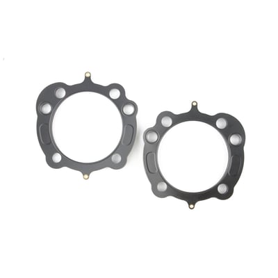 .030" thick MLS (Multi Layer Steel). Consists of a top and bottom layer of embossed stainless steel with both side coated with 250°C high temperature polymer rubber layer. The inner ring(s) are also stainless steel. The gasket layers are rivited together, outside the gasket surface, for ease of installation. The outer layers are embossed and both sides coated with a 250°C resitant polymer rubber layer. MLS head gaskets eliminate the use of dowel pin o-rings.