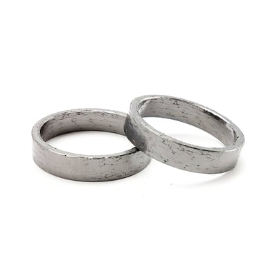 Compressed graphite wire mesh. Replaced exhaust to cylinder head gasket.
OEM replacement reference 65900011.