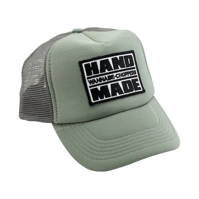 The Wannebe Choppers Trucker cap with authentic detailing and pre-curved peak. Made of 100% polyester with snap back closure, top stitch on the peak and logo patch on the front. A timeless cap that will never go out of style.
