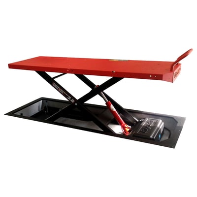 Black powder coated. Max load: 750kg; Lift weight: 260kg; Min height: 20cm; Max height: 130cm; Table top: 220cm long x 75cm wide; Table top with side wings: 220 long x 92cm wide; Side wings: 212cm long x 8.5cm wide; Rear slide-away drop gate panel: 60cm long x 36cm wide; Overall dimensions: 230cm x 92cm; Floor dimensions: 225cm long x 80cm wide x 19.5cm deep; Run-up ramp: 82 x 51cm. 
Professional recessed scissor style motorcycle lift, designed to be build into the floor of the workshop. Essentially identical to the Absolute 756 - Gate but due to its recessed design the Absolute 756 - Gate Floor offers easier on-off rolling of heavy bikes and the super clean looks in the down position that only recessed lifts can offer. Required built-in floor dimensions: 225cm long x 80cm wide x 19.5cm deep. Comes with a 230V electric operated hydraulic pump with a wired remote control for easy & dependable control with built-in magnet for easy storage on the lift. A slide-away rear drop gate panel of 60cm long x 36cm wide allows easy access to the rear wheel. Full table top length is 220cm long x 75cm wide without side wings. The side wings are 212cm long x 8.5cm wide and run on both sides over its full length for easy momentary storage of nuts, bolts and other small parts. The lift comes with safety locking positions in 8 different heights and a removable front safety bar to prevent over-shooting the lift when rolling on the bike.