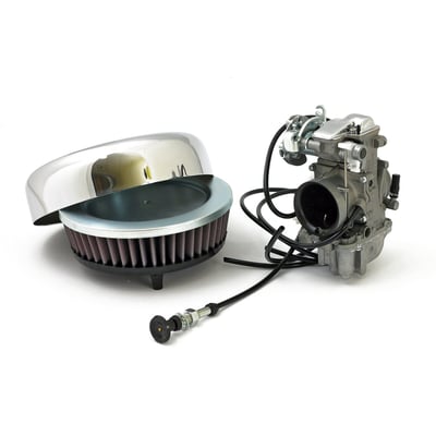 Complete flat slide carb kit with a 40mm venturi. Includes carburetor, air cleaner, chrome cover and mounting hardware and rubber manifold adapter that will fit stock Shovelhead carburetors. 
Note: Comes without roller bearings, that are incorporated in this later model, for throttle slide support. Throttle cables must be custom fabricated.