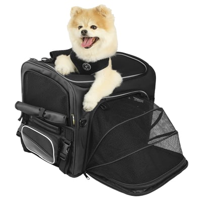 '- Spacious main compartment for pets up to 20 lbs (9kg).
- Mounts to tour trunk racks, sissy bar or seat using quick release and self-fastening straps.
- Rigid construction and solid base panel provides a safe environment for your pet.
- UltraMax® fabric for UV protection.
- 2 large side panels unzip allowing maximum air flow with a strong fixed mesh panels for added safety.
- Smaller side mesh vents are permanently open to always allow some airflow into the carrier.
- Large lid opening for ease of access to, and removal of pet.
- Lid has 2 stage zipper opening:
* 1st zip allows only flap to open with mesh closed for air flow.
* 2nd zip also opens mesh panel to allow pet look out while on integrated leash.
* Both lid panels roll back, with tab to secure open.
- Wide front panel also has 2-stage opening.
* 1st zipper opens with mesh porch.
* 2nd zipper opens completely.
* Mesh porch allows more room for pet when not mounted to vehicle.
- All 2 stage openings have zippers that securely latch together that can’t be opened from inside.
- Base has soft/padded removable panel for pet comfort and easy cleaning.
- Attached adjustable leash* allows pet to be secure yet move freely.
* pet must wear harness, not choke collar when riding in carrier (not included).
- 2 side pockets for storing pet essentials.
- Integrated top carry handle and side handles make it easy to transport on/off the bike.
- Reflective piping enhances visibility.
- Main compartment: 17" (43cm) L x 12" (30.5) W x 15" (38cm) H. 50 Liters.