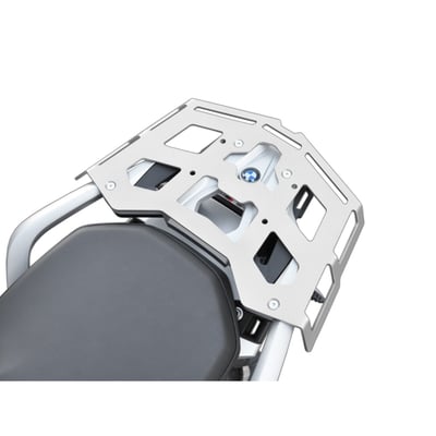 This silver powdercoated luggage rack is made from 4mm thick and laser cut aluminum. It can be mounted to the original support plate to enlarge the rack's surface area. The slots for the fastening straps secure the luggage directly on the luggage rack. 