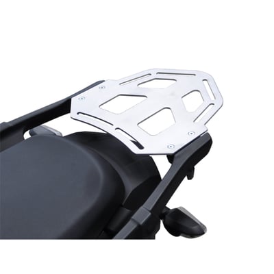 This silver powdercoated luggage rack is made from 4mm thick and laser cut aluminum. It can be mounted to the original support plate to enlarge the rack's surface area. The slots for the fastening straps secure the luggage directly on the luggage rack. 