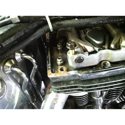 Twin Cam engines make a lot of noise inside the rocker cover. This is due to the way H-D designed the rocker arm installation. The bolt that locks the rocker shaft is not a tight fit at all, when installed it allows the rocker shaft to rotate slightly forward and backwards in the housing. There it hits the rocker shaft bolt, which provides you with the unnecessary clicking sound. This kit comes with 4 precision tapered bushings that fit around the rocker shaft bolts when it is installed, which eliminates rocker shaft movement. It does not interfere with the working of the rocker arm. The kit includes a washer and nut for installation and the required tool for aligning the rocker arm shaft correctly, before the bushing is installed. An experienced mechanic should be able to get the bike back on the road in around 3 hours. 

Note: When the rocker shafts require removal a new Rocker Locker kit will be required.