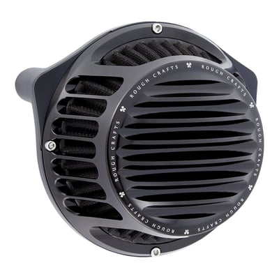 A contemporary round shaped air cleaner assembly. The back plate of this filter is CNC machined from cold forged aluminum for a maximum in strength. The open filter cover offers a maximum Rough Crafts design, a minimum in weight and a maximum in breathing capabilities. The filter element is USA made of a special synthetic material that offers better water resistance and will not require oiling, just cleaning. Compatible with stock to high performance engines.
Note: The breather design used is the patented Arlen Ness Big Sucker design. Breathers are o-ringed at the heads, pass through the backing plate and proprietary shooter tubes are placed inside the mouth of the throttle body. This allows a perfect breathing action and effectively eliminates all external breather hoses for the ultimate in clean looks.