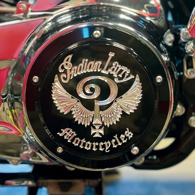7.75" diameter. 
Gloss black with clear etched logo. 
Manufactured from precision-detail CNC machined aluminum. 
With the 'Indian Larry' logo prominently CNC etched for the true vibe that allows Classic and Style to come together in this original Indian Larry clutch cover. 