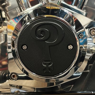Matte black powder coated finish. 
The Question Mark with Larry's classic CNC etched 'Question Everything' logo. 
This is where Classic and Style come together in the one of a kind Indian Larry timing cover. 
Note: Physical dimensions of 2-hole point covers are identical. However 70-99 B.T. (excl. Twin Cam) and 04-22 XL come with horizontal mount holes, 71-03 XL models have vertical mount holes. This influences images and/or text once installed.