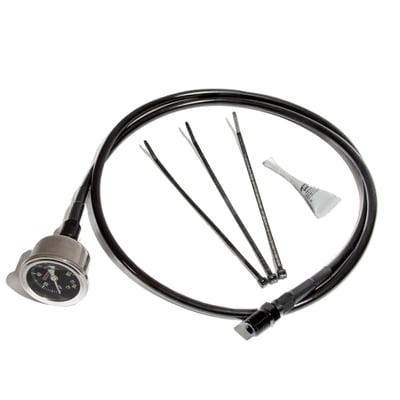 Used to additionally check engine oil pressure with a liquid filled mechanical stainless gauge, with PSI face, while keeping your factory electronic gauge and or low oil pressure indicator light hooked up. Kit includes all needed fittings to hook up the engine. Line is 45" (114cm) long. Hooks up to existing oil psi ascending unit port, oil line routes up the right side frame rail, gauge fastens to the handlebars using zip-ties and spacers.
Hooks up to the engine case via the pressure port to the oil filter, remove the factory 1/4 NPT plug and install the Feuling fittings.