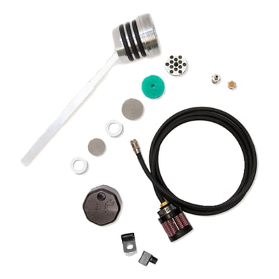 Hard anodized black finish.
Feuling billet dipsticks vent/breathe excessive crank case pressure from the oil tank through a PCV style breather, consisting of an oil separator system, perforated disc, replaceable filter element and umbrella flapper valve. Feuling vented dipsticks screw into the factory oil fill spout as a stock replacement part. These breathing dipsticks remove unwanted build-up of blow by pressure in the oil tank.
Blow by is pressure that is forced past the rings and cylinders, pushed into the crankcase and then forced into the oil tank. FEULING dipsticks help remove this unwanted pressure through a (CVS) Crankcase Ventilation System. Test results show a decrease in engine oil sump levels, more freely/smoother revving engine, increased MPG and decreased blow-by.
Note: All internal combustion engines have a certain amount of blow by. Larger cubic inch engines as well as engines with worn and or loose ring clearances will have increased blow by. Engines pushed to their limits will also produce excessive build up of ‘power robbing’ blow by.
We include 2 venting styles (Options) to choose from when installing the dipstick:
OPTION 1.) 1/8 NPT breather vent fitting with internal porous filter element. This option gives a clean look however it can produce an oil misting/residue out of the element on engines with excessive leak down/blow by.
OPTION 2.) Quick disconnect coupler fitting with rubber hose and filter element. This option will run any excessive oil misting/residue through the line and into the filter element. However this option does requires disconnecting the fitting in order to check the oil. This is Feuling's preferred option as it breaths more than option 1.
For option 2, we recommend routing the line up the frame rail, up under the seat/abs area then back down along the right side frame rail and the filter element can fit cleanly between the engine/trans matting area on the inside of the lower right frame rail.
Note: This dipstick does get hot, use a glove when checking oil level.
Checking oil level:
There are two ways to read the oil level with this dipstick, with the bike on the jiffy stand (FHS) or the bike upright and level (FHU).
FHS = FULL HOT STAND If reading the dipstick with the bike on the jiffy stand you will take your reading from the dimples labeled FHS (Full Hot Stand).
FHU = FULL HOT UPRIGHT When reading the dipstick with the bike upright and level you will take the reading from the dimples labeled FHU (Full Hot Upright).
OIL LEVEL - DO NOT OVERFILL OIL TANK
It is important to get the correct hot oil level in your bike. Feuling recommends running the oil level 90%-99% full when hot.
Note: Letting the bike idle or warm up on the kickstand can naturally fill the engine case and skew the oil level in the tank.
We recommend the following steps to achieve proper oil level:
1. Check cold oil level.
2. Ride the bike until operating temperature is reached.
3. Shut the bike off while still in the upright position (This insures an accurate reading).
4. Once the bike is on the kickstand check oil level.
5. Add or remove oil as needed.
Note: Feuling in house testing shows venting the air cleaner to atmosphere may be problematic resulting in oil carry over/misting out of the breathers. When air filter venting is accompanied with the use of oil tank venting such as the Feuling vented dipstick and or a vented transmission top cover the oil carry over/misting can be increased.