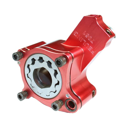 60% more scavenge, 18% more pressure than stock
The Super Scavenger oil pump has an increased scavenge ratio. Identical to the Feuling Race Series oil pumps but they feature a thinner pressure housing resulting in an increased ratio for the scavenge side of the oil pump. The increased amount of oil removed from the crankcase & cam chest helps reduce power robbing wet sumping and oil carry over. 
Like the Race Series oil pump manufactured from 7075 billet aluminum with military specs, a red hard anodized finish, blue printed and designed for performance. The 7075 alloy is 50% harder and stronger than 6061 aluminum and holds tighter tolerance under temperature. 
- High Flow 4140 heat treated Chrome Moly gerotor gears 
- Stock replacement for Twin Cam engines 
- When combined with the Feuling cam plate test results show 3 horsepower gain and 4 ft/lbs. of torque gain to the rear wheel, while lowering engine & oil temperature  
- Feuling cam plate advised but not required 
- Stock replacement for Twin Cam engines, recommended for both strip & performance street engines 
- Pressure Volume: 18% more than '99-'06 factory oil pump, 1% more than SE oil pump. 
- Scavenge Volume: 60% more than '99-'06 factory oil pump, 9% more than SE oil pump

