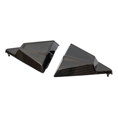 Woven, hand laid carbon. Made from a sheet of carbon fiber fabric woven in a crisscross pattern. Laid by hand into a mold, then cured in resin. The fabric layers are aligned in specific directions for strength. 

Carbon fiber side covers. Ultra light weight and manufactured from highest quality pure carbon fiber. The combination of weight reduction and the look of true carbon fiber makes these covers a must have add-on for any Club Style or performance orientated bike. Hassle-free installation. EU made. 
- Ultra light weight around 510 grams per set
- Manufactured from top quality carbon fiber 
- Gloss UV stable surface 
- With pins for a snap-on installation 
- Bolt-on replacement for the stock side covers 
- It is advised installation is done by a capable mechanic 