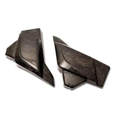 Forged carbon. Made from chopped carbon fiber strands mixed with resin and compressed in a mold. The result is a material that looks more like marble or camouflage, no two are alike, without a directional weave.

Carbon fiber side covers. Ultra light weight and manufactured from highest quality pure carbon fiber. The combination of weight reduction and the look of true carbon fiber makes these covers a must have add-on for any Clubstyle or performance orientated bike. Hassle-free installation. EU made. 
- Ultra light weight 
- Manufactured from top quality carbon fiber 
- Gloss UV stable surface 
- With pins for a snap-on installation 
- Bolt-on replacement for the stock side covers 
- It is advised installation is done by a capable mechanic 