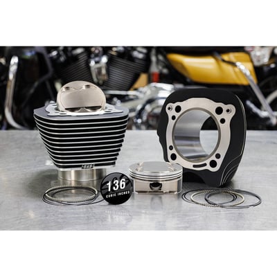High compression. 
Black cylinders with highlighted fins. 
With +8.5cc piston dome. 
Compression ratio 12.7:1 for 132" and 13.1:1 for 136" with stock 88cc heads. 
Compression ratio 12.1:1 for 132" and 12.3:1 for 136" with SE Extreme Port 94cc heads. 
Largest possible 4.320" bore bolt-in big bore kit. 
132" (2162cc) is achieved when used with stock 114" flywheels. 
136" (2222cc) is achieved when used with S&S 923270 4-5/8" stroker flywheels. 
Works with stock crankcases, case boring is not required, stock heads and retains stock engine height. Kit includes a forged 4.320" big bore forged piston kit, 4.320" big bore cylinders, 2 MLS (Multi-Layer-Steel) .040" head gaskets, 2 cylinder base gaskets, 4 cylinder dowels, exhaust gaskets and an S&S cubic inch cam cover badge. Black powder coated finish to match the OEM finish. 
Note: For the 132" kit S&S measured 135.51HP and 145.83 torque with stock heads, a 550 cam, stock throttle body and a high flow Stealth air cleaner kit. 
Note: Tuning of fuel injection and ignition may be required. 
Note: S&S advises 576972 S&S head bolt kit for all big bore applications. 
Note: 136" is not compatible with OEM 4-5/8" stroke flywheels, must use S&S 923270 4-5/8" stroker flywheels. 
Note: Not compatible with 107" (4.375" stroke) engines. 
