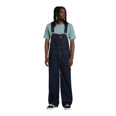 The Dickies Loose Denim Bib is a loose fit, straight leg denim bib. Made out of 14oz slub cotton denim, this bib features slanted front pockets, coin pocket,
multi-tool chest pocket, zip fly, side button closure, patched back pockets, hammer loop, ruler and tool pocket, and woven Dickies labels on front above chest pocket and on back patch pocket. A work ready bib with movement and comfort built in. Available in several colors for men and female.

• Loose fit
• 100% cotton