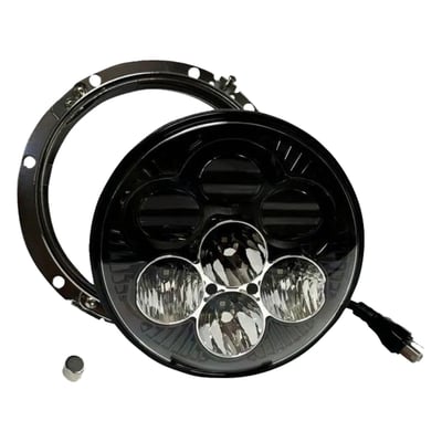 With DOT, SEA and ECE approval. 
LED headlamp comes with 6 individual selectable backlight colors, including orange, yellow, green, blue, purple, red or off. Color changing of the backlight is controlled by magnet operation. Just 'touch' the sensor inside the headlamp with a magnet, each time flip the magnet over to change the magnetic field and 'touch' again for the next color. 
Specifications: 
- Specialized for motorcycle on-road use 
- DOT, SAE & ECE compliant design 
- Matte black aluminum housing 
- Durable polycarbonate lens 
- High performance illumination 
- 5800-6500K daylight color temperature 
- Low beam: 3600 raw lumens, 2651 effective lumens (3 projection LEDs) 
- High beam: 9080 raw lumens, 4485 effective lumens (4-direct reflective LEDs) 
- Low beam stays on with high beam 
- Color changing backlight with 4 pre-set colors 
- Magnet controlled backlight 
- Includes wire harness to power backlight independently if desired 
- Minimized current draw 
- Plug & Play installation 
- Equipped with H4 connector 
- Waterproof IP67. 