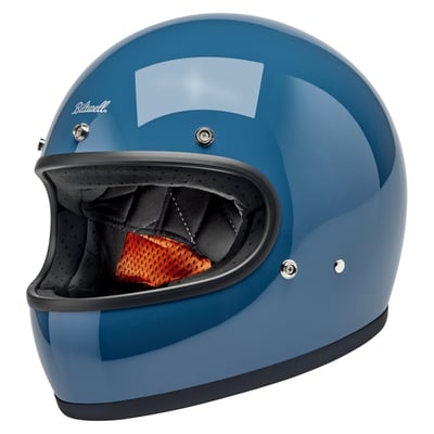 The Biltwell Gringo takes its '60s motorsport aesthetic and elevates it to modern ECE R22.06 and DOT motorcycle standards. The injection-molded ABS outer shell is rugged yet lightweight with hand-painted beautiful colors. Removable/replaceable comfort liner and cheek pads feature brushed fleece Lycra touch points to absorb and evaporate perspiration. Also there are speaker cut-outs for intercoms and a double d-ring chin strap.