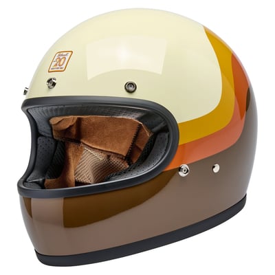 The Biltwell Gringo takes its '60s motorsport aesthetic and elevates it to modern ECE R22.06 and DOT motorcycle standards. The injection-molded ABS outer shell is rugged yet lightweight with hand-painted beautiful colors. Removable/replaceable comfort liner and cheek pads feature brushed fleece Lycra touch points to absorb and evaporate perspiration. Also there are speaker cut-outs for intercoms and a double d-ring chin strap.

Biltwell is celebrating twenty years of good times with this limited edition run of 20th Anniversary helmets with unique custom  graphics and all-new lush interior liners.
