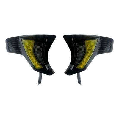 With a single intensity Selective Yellow LED turn signal only setup behind an authentic SAE selective yellow lens. 
DOT-compliant. 
Premium integrated LED illuminated front turn signal vents, designed to replace the non-illuminated vented speed plates in the Custom Dynamics Shark Demon® 2 Road Glide head lamp kit (MCS 720025 or MCS 720026) , which are sold separately. These turn signal vents will not fit stock or any other aftermarket headlamp kit. 
Features a gloss black assembly with bold, race-inspired fin styling, decorative mesh with a modern look and enhanced safety. Factory air flow is retained. 
- Decorative mesh 
- Bolt on installation 
- Plug & Play. 
Note: Compatible with Shark Demon® kits MCS 720025 or MCS 720026 only and is not compatible with any other stock or aftermarket LED headlamp kit. 