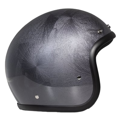 Embrace the fusion of classic style and modern functionality with the DMD Retro helmet, a nod to the iconic 70's design. This helmet isn't just a protective gear but a statement piece, crafted for those who dare to stand out. With its ECE 22.06 approved fiberglass shell available in three sizes, it offers a snug fit. The helmet is bluetooth ready, features integrated snaps for visors, and boasts a luxurious, washable lining with Velcro for a custom fit. Secured with a padded chin strap and a reliable Double D-ring closure, this helmet is the perfect blend of vintage charm and contemporary comfort.