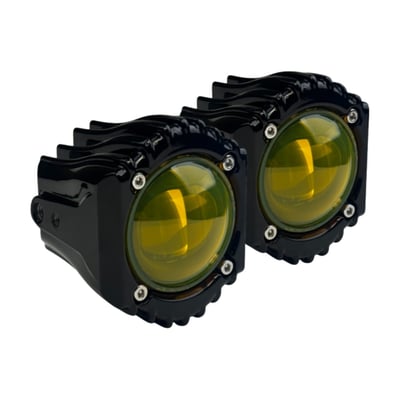 Upgrade your ride and own the night with Shark Demon® LED Fog Lights. These lights bring aggressive, industrial styling to your bike, perfectly complementing Shark Demon® headlights with signature fins and exposed screws for a bold, mechanical look. The gloss black aluminum housing delivers a sleek yet rugged aesthetic, combining lightweight strength and lasting durability with a high-end finish. Impact- and scratch-resistant polycarbonate lenses shield against road debris and tough riding conditions, keeping your lights crystal clear mile after mile.

Each pair delivers a powerful 4140 raw lumens (2080 effective lumens), flooding the road with brilliant light to dramatically enhance nighttime visibility and riding safety. Choose your ideal beam: crisp, daylight white (5800-6500K, clear lens) for unmatched clarity in city riding or clear weather, or selective yellow (2900-3100K, yellow lens) to cut through fog, rain, and snow by reducing glare and boosting contrast. Shark Demon® LED Fog Lights are fully SAE and ECE compliant for on-road use, and the IP67 waterproof rating ensures they're sealed tight against water and dust for all-weather reliability. The adjustable beam design provides flexible vertical or horizontal mounting, letting you direct light exactly where you need it most.

Installation is effortless with the included plug-and-play wiring harness—achieve a clean, tool-light setup in no time, right under your seat with integrated on/off switch with 5 ft wire length for operation. Plus, with a wide range of compatible mounting solutions available (sold separately), these lights securely fit virtually any Harley-Davidson®. Combining bold style, advanced engineering, and road-tested performance, Shark Demon® LED Fog Lights are the ultimate upgrade for riders who demand more. Patents pending.