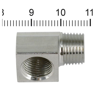Stainless steel. 
90° angle - 1/8" NPT male to 1/8" NPT female. 
OEM replacement reference 26338-68A