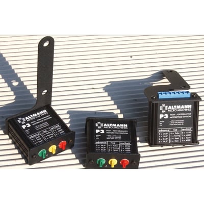 Custom, no coil mounts. Compatible with stock crank sensor & coil. Three control knobs allow 4 settings for each range; maximum advance, advance curves and rev-limiter in 5750, 6000, 6250 and 6500 RPM. On stock motorcycles the ECU unit does not need to be removed, this way the ignition will work with the stock immobilizer and the ECU will only control the stock electronic speedo. On CAN-bus (HD-LAN) models the kill switch and tachometer (RPM) will not work. Will also work on fuel injected Evo models and 08-10 Buell XB (which have a crank sensors). Used on H-D engines to install an advanced, fully adjustable and dependable ignition system. Super simple to set-up, easier than a points ignition! Perfect for any stock to performance application and absolutely brilliant to get an engine running when converting from injection to carburetor. Adjustments can be done with engine off or running. Custom bikes require nothing else than the Atmann ignition, and the bike will run. No computer required. Suitable to provide best timing for maximum power for all engine capacities and tuning levels, including stock. Perfect idle at 900RPM or even at 350RPM, what ever your preference. Complete with instruction manual. Dimensions are 6x7x3cm, smaller than a pack of cigarettes.