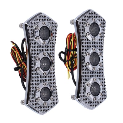 Left & right set. 
Functions as a 3-1 taillight, brake light, turn signal combo. Red in the middle and amber in the ring. ECE approved. Comes with 12 high power LEDs. Designed for a custom installed on the rear fender, saddlebags or filler panels. CNC machined from billet aluminum. Vity's Design manufactures products for those not shy of some attention. Designed as a balanced mix between the refined grace of classic elegance and a radical retro head turner. Apart from the visual stimulance, their attention to detail is nothing less than extraordinary. For those on route to glamour and grace, these are the parts that'll help you cross over to previously unknown custom levels. Perfect to style match with other Vity's Design products. Dimensions: 5.20" (13.2cm) long x 2.15" (5.4cm) wide. 

