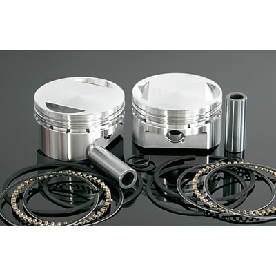 Standard 9:1 compression ratio ratio with forged flat top pistons. Includes Hastings rings, circlips and wrist pins.