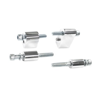 Polished. Used to offset the rider floorboards outwards for a more comfortable seating position and to keep feet and clothing away from exhaust pipes, painted side covers, chrome primary cover and chrome derby cover