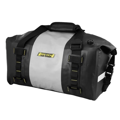 '- 100% waterproof duffle bag 
- All seams are electronically heat welded 
- Made from waterproof and durable PVC Tarpaulin 
- Watertight roll closure with quick release buckles 
- UV Coated outer material cleans easily and prevents slipping or marking 
- Securely mounts using patented RIGG STRAP® system 
- RIGG STRAP® can also be used as a separate tie down system 
- Removable internal panels help bag hold its shape 
- Can be mounted across or along seat or tail section 
- Purge valve makes for compression easy 
- Dual-purpose carry handles can be used as compression straps 
- Reflective accents for enhanced visibility 
- Easily mounts to motorcycle, ATV/UTV, PWC, and snowmobile 
- 40 liter. 20" long x 11" wide x 11" high