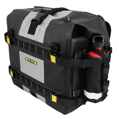 '- 100% waterproof
- All seams are electronically heat welded
- Made from waterproof and durable PVC Tarpaulin
- Watertight roll closure with quick release buckles
- UV Coated outer material cleans easily and prevents slipping or marking
- Securely mounts using patented RIGG STRAP® system
- Removable stiffener allows bag to hold its shape when empty
- Side bottle pocket large enough to hold 30 oz bottles (Bottles not included)
- Side MOLLE panel to add other optional accessories
- Each side is collapsible with compression straps for smaller loads
- Firm internal back plate helps support bag
- Replaceable back pad helps protects bags from contact with rack
- Metal D rings can be used to mount dry roll bag on top
- Purge valve makes for compression easy
- Reflective accents for enhanced visibility
- Includes 2 lightweight saddlebag liners to easily pack contents and remove
- Easily mounts to most motorcycles with racks
- Main compartment measures: 15" (38cm) long x 8" (20.3cm) wide x 14" (35.6cm)high
- Holds approx. 28 liter per side