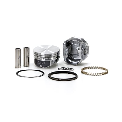 Standard compression. 883-1200 conversion piston set. Compatible with stock unmodified cylinder heads. 9:1 stock compression ratio. Pistons are flat top, .125" below deck height, to achieve a 9:1 CR with a compression height of 1.090". 
Piston weight 310gr. Piston pin diameter .792" and weight 97gr. 
Head type: Flat top / Dome +0.5cc. 
Compression height 1.090". 
Bore 3.498" / Stroke 3.812". 
Rod length 6.926" / Cyl. length 4.650". 
Comes with T6 heat treated 390 Hypereutectic cast pistons with 16% silicone levels which enables running a very tight clearance for longevity and hardly any piston noise. 

Note: Top compression ring will need additional clearance. See instructions. 
Note: 1200cc cylinders must be purchased for 04-up 883 XL models. Stock cylinders liners of 04-up XL models are too thin to bore to 1200 size.