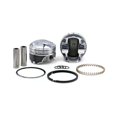 Forged piston set. 9.0:1 CR with 112cc head.
Piston weight 416gr. 
Piston pin weight 97gr. 
Piston pin dia. .791" / offset. 
Head type: Dome with -52.7cc. 
Compression height 1.285". 
Bore 3.498". 
Stroke 4.250". 
Rod length 7.440". 
Cyl. length 5.330". 
All KB forged pistons are made from 4032 alloy, a 11% silicon alloy that is formed in a forging press. Forging aluminum gives a superior strength and structural integrity on a molecular level, after which it is fully machined. The combination of this alloy and the forging process allows the piston to flex under detonation, or pre-ignition, giving the best resistance to cracking. Although 4032 has a low expansion rate, it is higher than the cast Hypereutectic. Therefore forged KB pistons will require about .001" wider piston to wall clearance. Pistons are sold as sets, complete with wrist pin retaining rings, wrist pins and piston rings. 

Note: All KB forged pistons come equipped with offset wrist pins / piston pins. There is a front and rear section on the piston and it is necessary to install it in the correct way. Please refer to the installation instructions, as provided with the piston set, prior to installation.