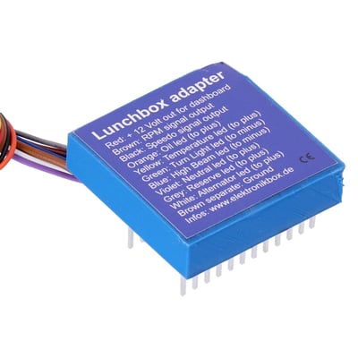 The Lunchbox Adapter allows the connection of several new speedos on the old harness connector what was connected to the old BMW speedo in older K models. The adapter makes the conversion of the old harness signals to a modern speedo easy. 10 output cables provide all necessary signals. The neutral signal is now compatible with modern speedos and the virtual load for the alternator is built-in. Fuel reserve signal for upto 1985 models is integrated. 
- Dimensions: 51 mm length x 51 mm wide x 15 mm height w/o connectors
- Body material: Shock resistant ABS plastic, waterproof poured raisin 
- Case Color: Black 
- Connections: 0,14 qmm, 20 cm to the new speedo, 2 x 12 pin to original harness 
- Maximum ambient temperature: 80 degree Celsius 
- Input voltage range: 7 - 18 Volt