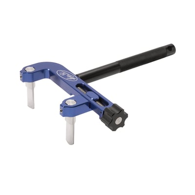 This tool securely holds clutch hubs on most motorcycles and ATVs. It can be used to remove the locking ring on UTV fuel cells to remove fuel pumps 
- Reversible blades work on conventional square spline and on round spline style (KTM/Husqvarna) clutch hubs 
- Aircraft grade billet aluminum body with durable blue anodized finish 
- Precision machined stainless steel blades are strong and durable 
- Billet aluminum clamp knob for fast and easy installation and removal 
- Extended knurled handle provides sure grip when removing or torquing the clutch hub nut 
- Tool jaws have a range of 75mm (2.9") to 120mm (4.72")