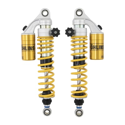 - Yellow springs 
- Clear body 
- S: Single tube body 
- Piston diameter: 36mm 
- P: Monotube high pressure gas type shock absorber with external "piggy back'' reservoir 
- R1: Adjustable rebound damping. Adjuster wheel above the end eye 
- C1: Adjustable compression damping. Adjuster wheel or slot on the reservoir 
- L: Adjustable length 
- Length: 360 +10/-0 mm 
- Stroke: 101 mm 
- Rate N/mm: progressive 15-24 N/mm 
- Position: rear 
- Mounted spring: 60480-11 
- Packaging unit: pair 
The STX36 is a shock that's been around the block and it paid it's dues when it comes to performance and durability. Especially for the cruiser market when taking riding a step up, the STX36 is an excellent investment when suspension characteristics are important to you.