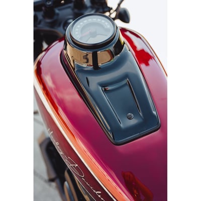 Unpainted gloss black finish. Used to move the OEM speedometer from the handlebar to the fuel tank. A classic look that will set your bike apart for sure. Installation is made easy with the included speedometer conversion kit. Made from 100% ABS, which is CNC machined, a combination that allows extremely small tolerances, for a perfect fit. Includes all installation hardware. 
Note: Comes with approval. Check your local MCS dealer or the MCS sales department for exact type of approval and validity on bike model and years on the test report.