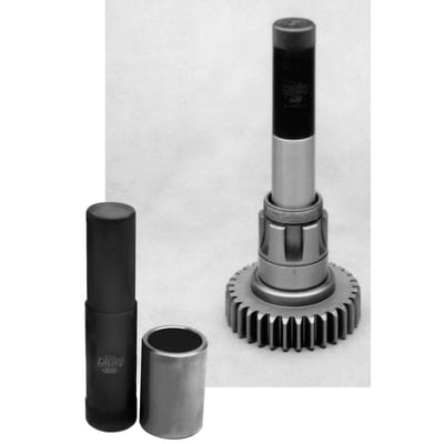 Removes & installs main drive gear bushing; Installs cam bushing