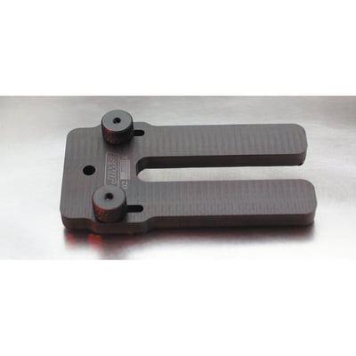 Supports piston when installing rings and cylinder