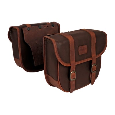Nothing more universal usable than a set of throw-overs. 
Cowboys used them, now bikers do. Made of a combination of waxed cotton and leather. 
Leather is used on most abrasive point, like all edges and parts with the highest level of stress like the mounting flap and bottom part of the bag.
Complete with reinforced backside. 
Approx. dimensions: 29cm long x 26cm high x 12cm thick. 
Sold in pairs. 
Note: The 'Waxed Cotton' material, as used in the LongRide product line, is manufactured from approx. 650gr/m 100% cotton cloth. This cloth is impregnated with wax, which makes it durable and gives it water repellant characteristics. This is the historically correct predecessor of synthetic developments like, for instance, Goretex. This is the genuine classic material. 
